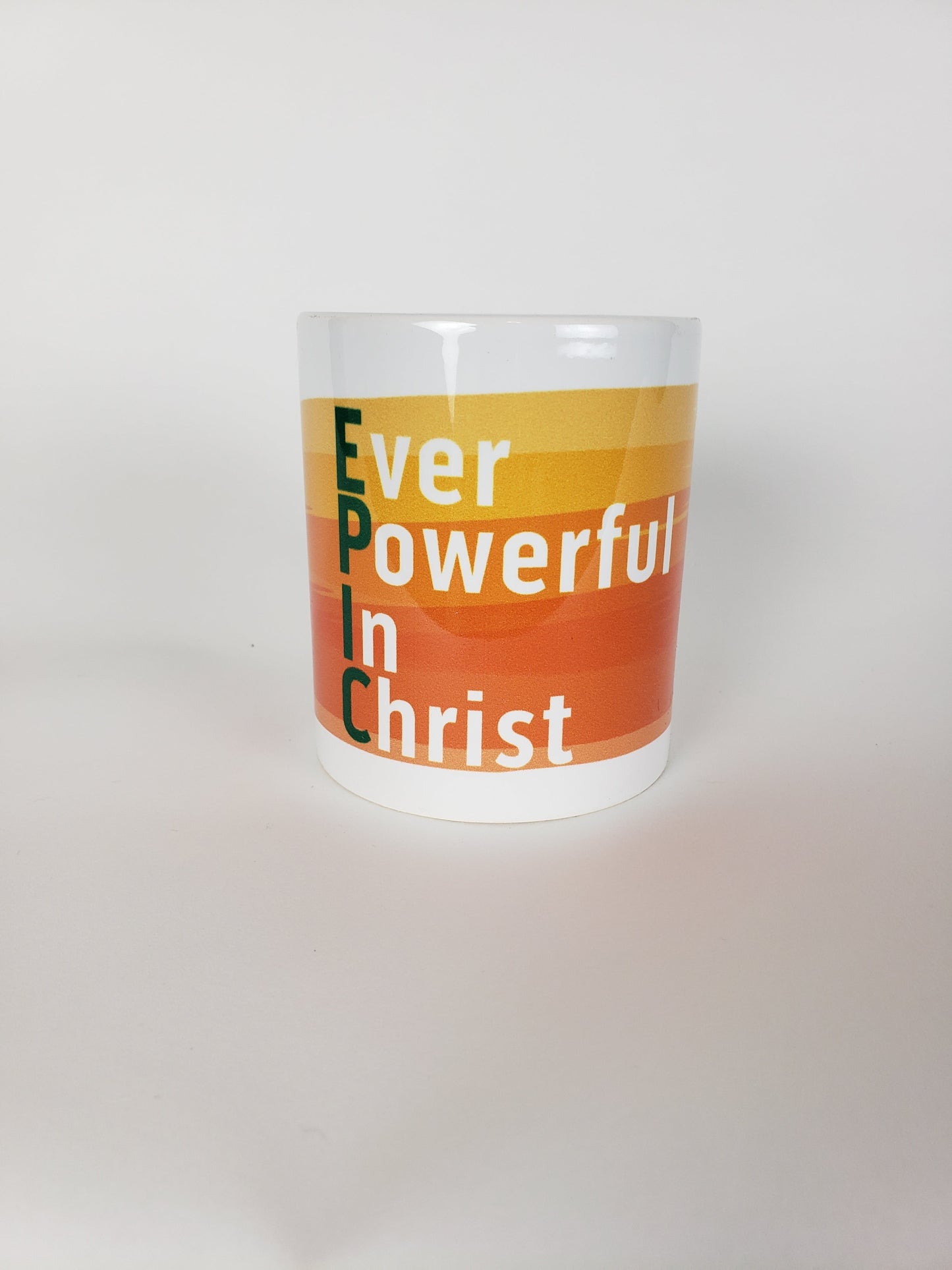 Ever Powerful In Christ Coffee Mug – Orange and Green